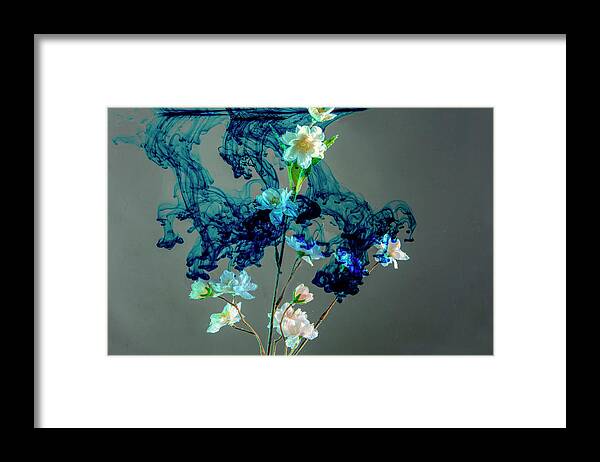 Floating Framed Print featuring the photograph Floating blue cloud surrounding flowers by Dan Friend