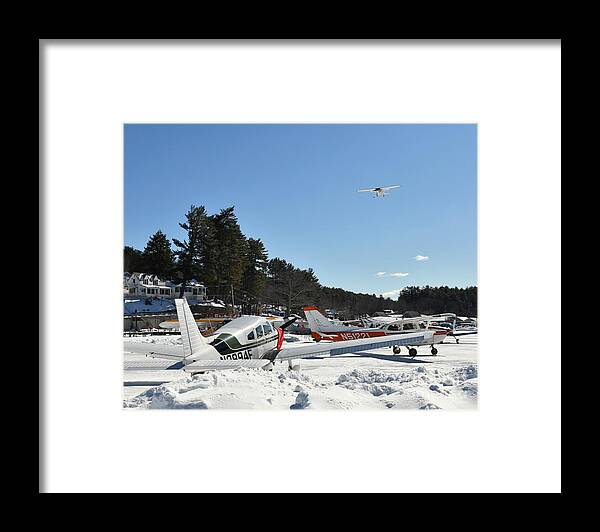 Ice Runway Framed Print featuring the photograph Flying Over the Big Lake by Steve Brown