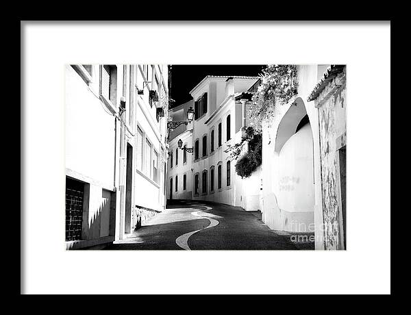 Follow The Street In Cascais Framed Print featuring the photograph Follow the Street in Cascais by John Rizzuto