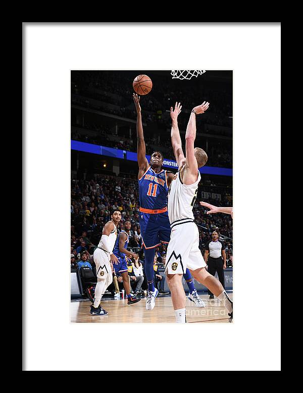 Nba Pro Basketball Framed Print featuring the photograph Frank Ntilikina by Garrett Ellwood