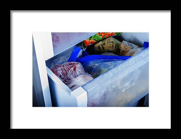 Mixing Framed Print featuring the photograph Frozen vegetables in freezer by Artursfoto