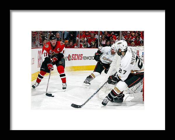 National Hockey League Framed Print featuring the photograph Game 4 - Anaheim Ducks v Ottawa Senators by Jim McIsaac