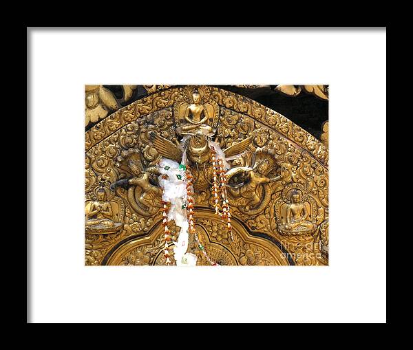 Garuda Framed Print featuring the photograph Garuda in a Buddhist temple by Juliette Cunliffe