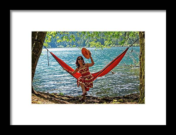 Hanging Framed Print featuring the photograph Girl In A Hammock Tipping Her Hat by David Desautel