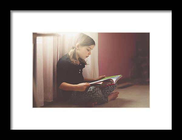 White People Framed Print featuring the photograph Girl reading in her bedroom by Rebecca Nelson