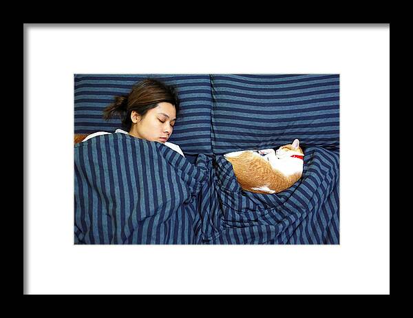Pets Framed Print featuring the photograph Girl Sleep With Her Ginger Cat by LewisTsePuiLung