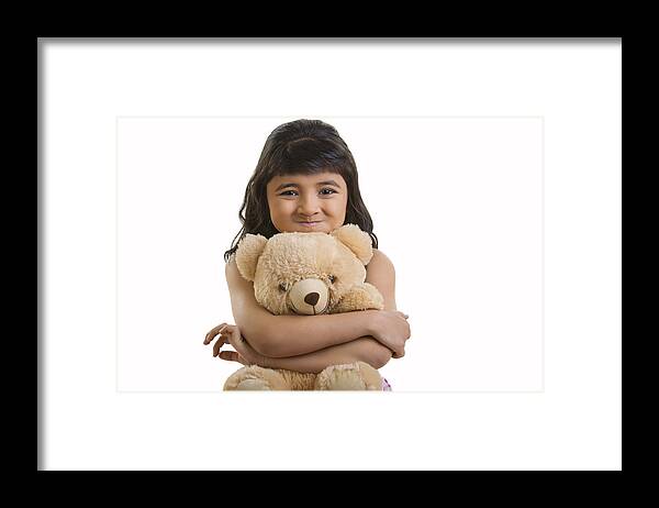 Child Framed Print featuring the photograph Girl with teddy bear by Madhurima Sil