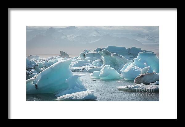Canon Framed Print featuring the photograph Glacial lagoon in afternoon light by Agnes Caruso