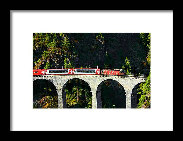 Glacier Express Framed Print featuring the photograph Glacier Express on the Landwasser Viadukt by Steve Ember
