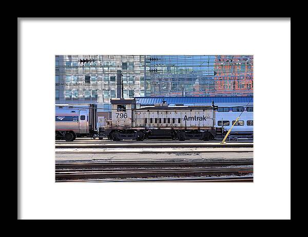 Railroad Framed Print featuring the photograph 'Goat' Getting It Done Amidst the Glamour by Steve Ember