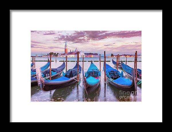 Gondolas Framed Print featuring the photograph Gondolas on the Venice Lagoon, Italy by Neale And Judith Clark