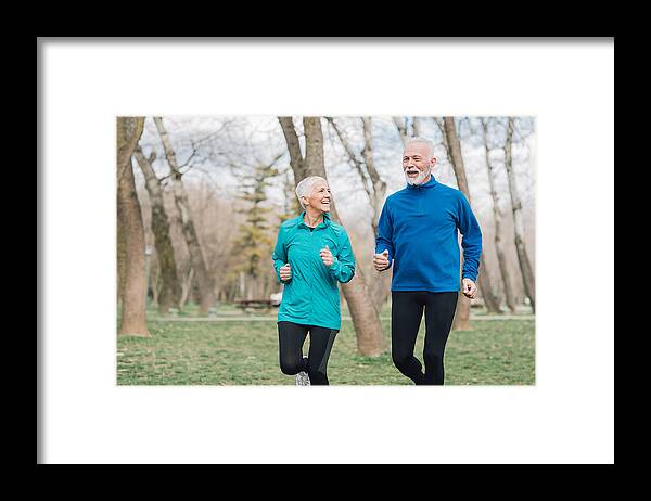 Mental Health Framed Print featuring the photograph Happy fit people running in the park by RgStudio