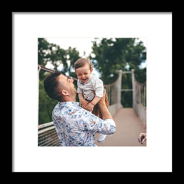 Child Framed Print featuring the photograph Happy photo father and child having fun outdoors by PhotoAttractive