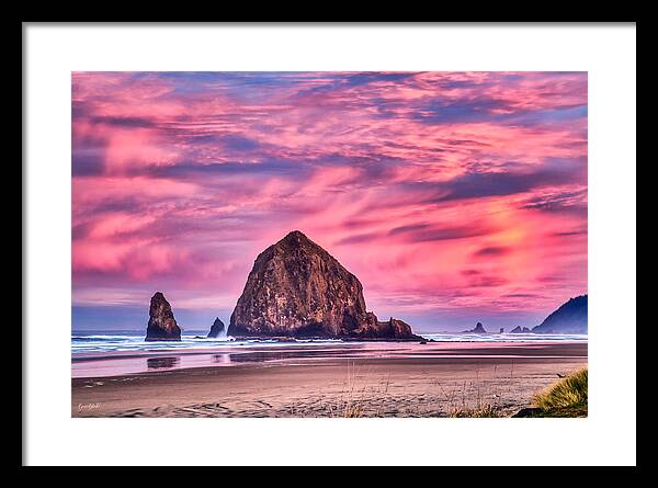  Haystack Rock Framed Print featuring the photograph Haystack Rock- first light by Bruce Block