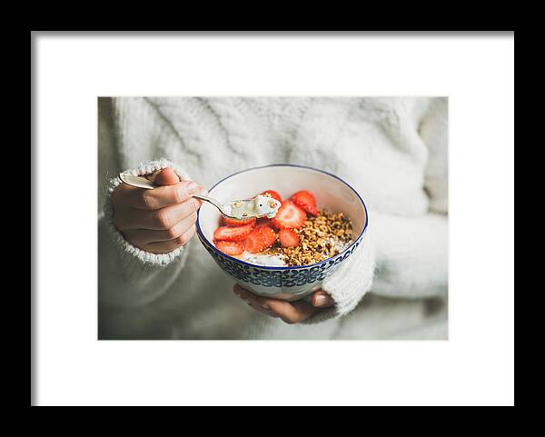 Spoon Framed Print featuring the photograph Healthy breakfast yogurt, granola, strawberry bowl in woman's hands by Foxys_forest_manufacture