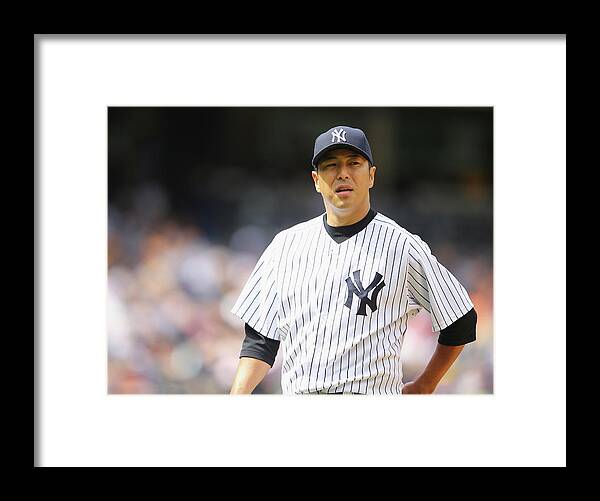 American League Baseball Framed Print featuring the photograph Hiroki Kuroda by Al Bello