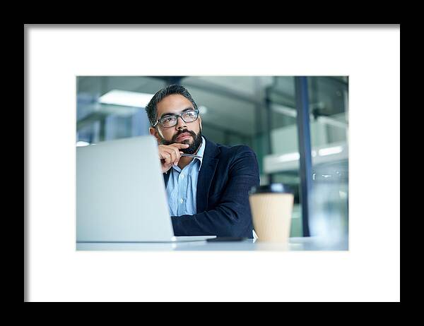 Working Framed Print featuring the photograph His mind always wanders to success by Tassii