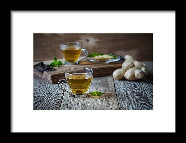 Environmental Conservation Framed Print featuring the photograph Hot ginger and mint tea, homemade green tea health benefits by Istetiana