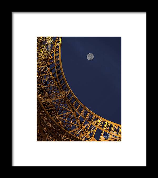 Eiffel Tower Framed Print featuring the photograph Hugging the Moon by Neala McCarten