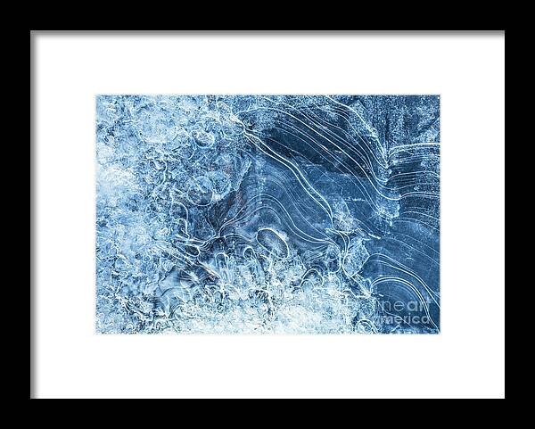 Ice Framed Print featuring the photograph Ice Patterns and textures in frozen lake by Neale And Judith Clark