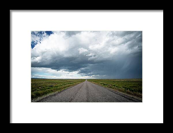 Storm Framed Print featuring the photograph Idaho Stormy Road by Wesley Aston