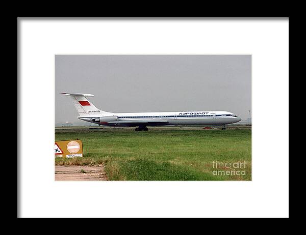 Il-62 Framed Print featuring the photograph Il-62 by Oleg Konin