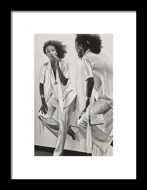 Model Framed Print featuring the photograph Iman Looking Into A Mirror by Chris von Wangenheim