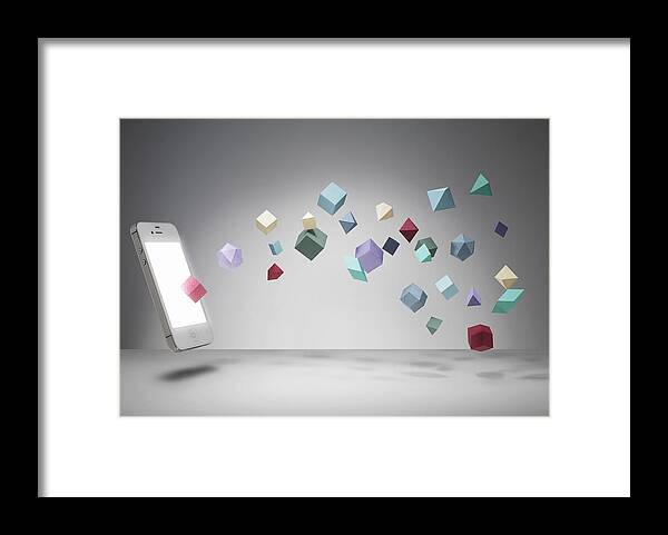 Technology Framed Print featuring the photograph Iphone with geometric shapes by Howard George