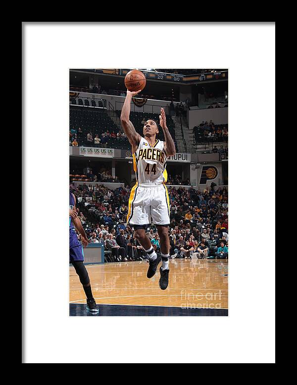 Jeff Teague Framed Print featuring the photograph Jeff Teague by Ron Hoskins