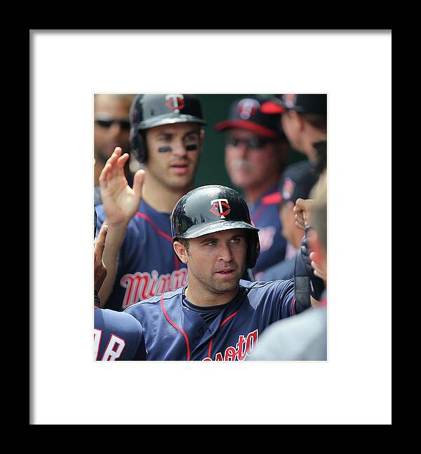 Joe Mauer Framed Print featuring the photograph Joe Mauer, Trevor Plouffe, and Brian Dozier by Ed Zurga