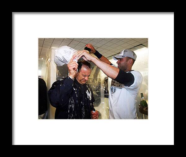 American League Baseball Framed Print featuring the photograph Joe Torre and Derek Jeter by Ezra Shaw