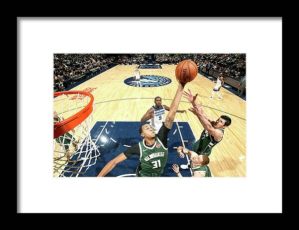 Nba Pro Basketball Framed Print featuring the photograph John Henson by David Sherman