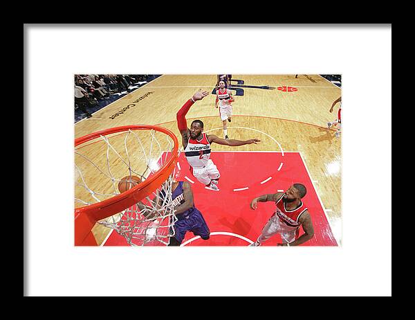 Nba Pro Basketball Framed Print featuring the photograph John Wall and Eric Bledsoe by Ned Dishman