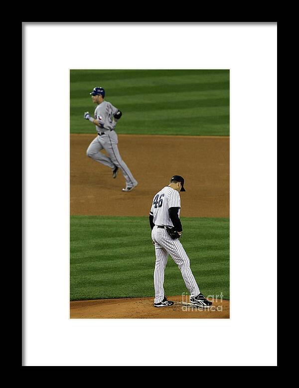 Playoffs Framed Print featuring the photograph Josh Hamilton and Andy Pettitte by Jim Mcisaac