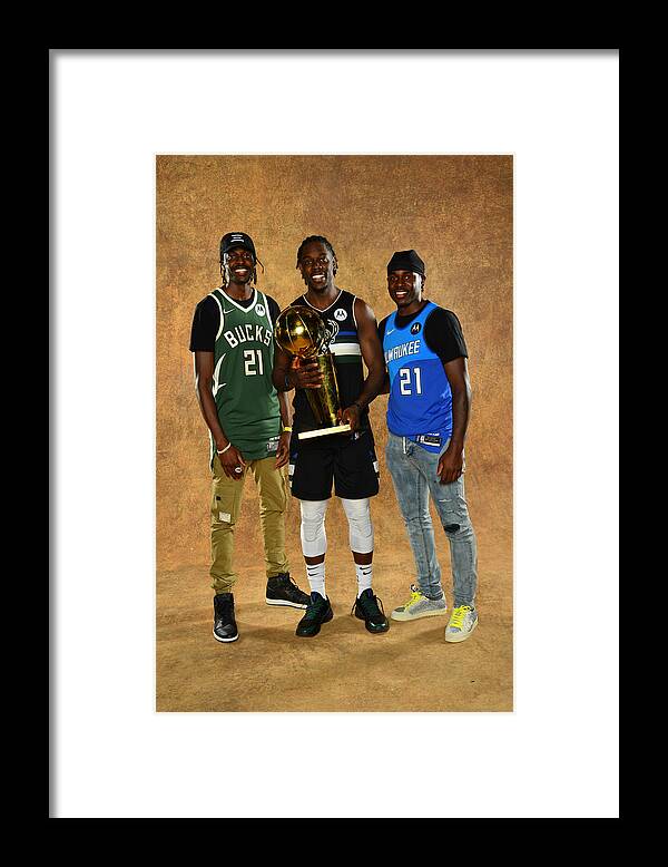 Justin Holiday Framed Print featuring the photograph Jrue Holiday and Justin Holiday by Jesse D. Garrabrant