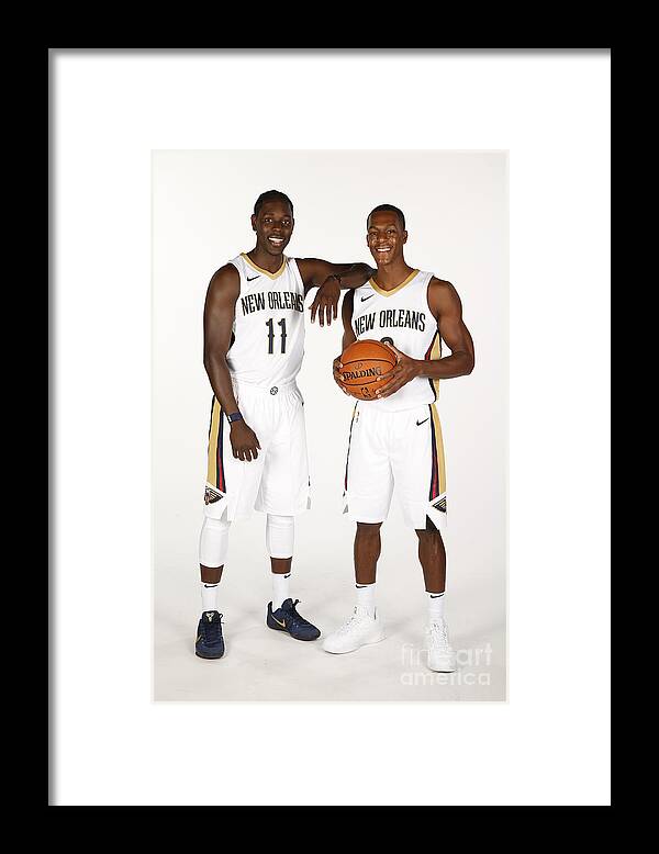 Media Day Framed Print featuring the photograph Jrue Holiday and Rajon Rondo by Jonathan Bachman