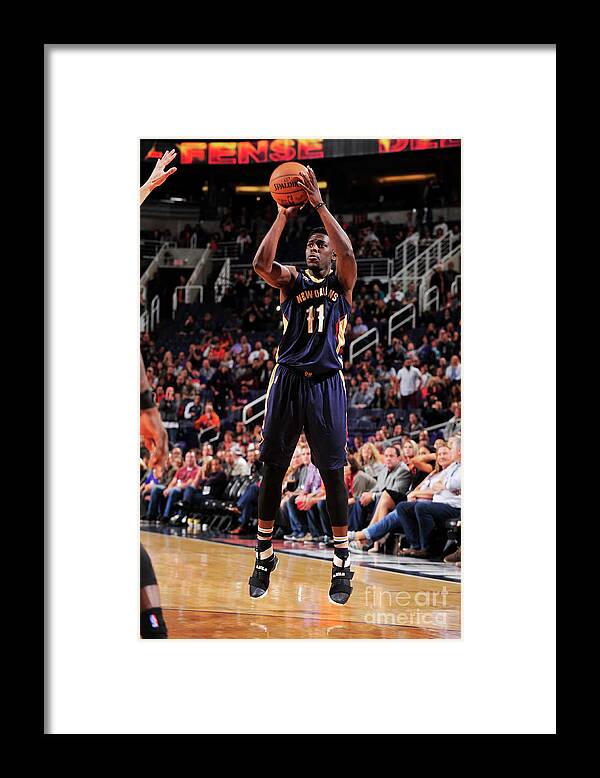 Jrue Holiday Framed Print featuring the photograph Jrue Holiday by Barry Gossage
