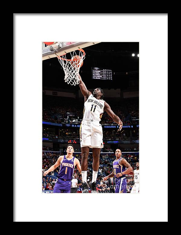 Smoothie King Center Framed Print featuring the photograph Jrue Holiday by Bill Baptist