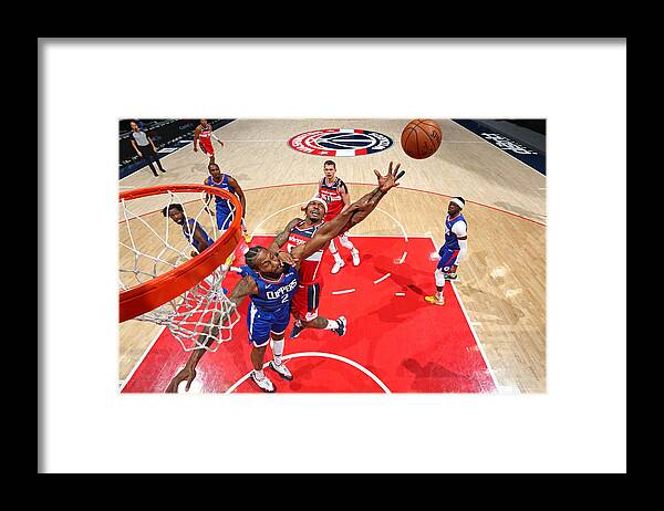 Nba Pro Basketball Framed Print featuring the photograph Kawhi Leonard and Bradley Beal by Stephen Gosling