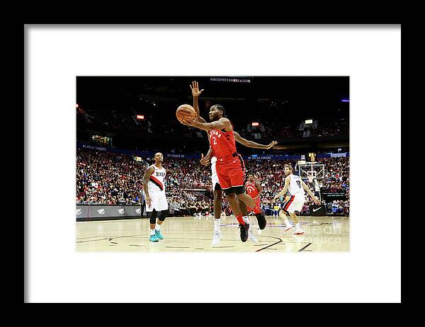 Kawhi Leonard Framed Print featuring the photograph Kawhi Leonard by Jeff Vinnick