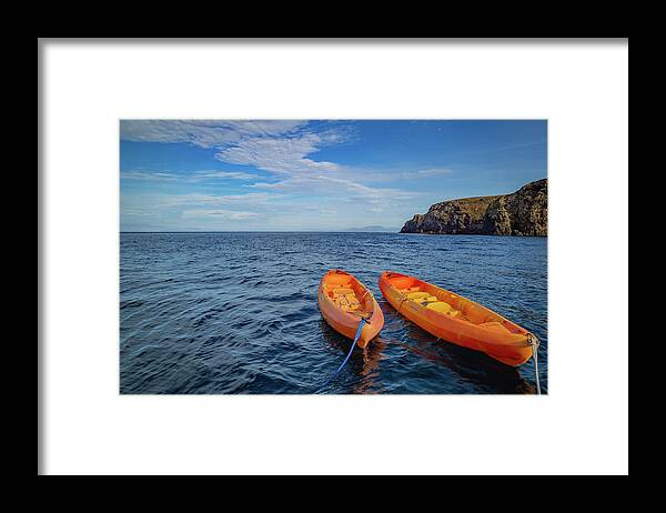 Kayaks Framed Print featuring the photograph Kayaks in the Pacific by Cindy Robinson