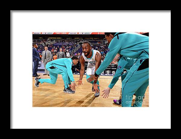 Kemba Walker Framed Print featuring the photograph Kemba Walker by Barry Gossage