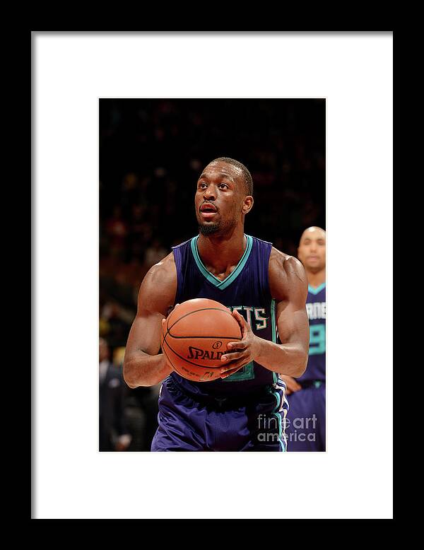 Kemba Walker Framed Print featuring the photograph Kemba Walker by Ron Turenne