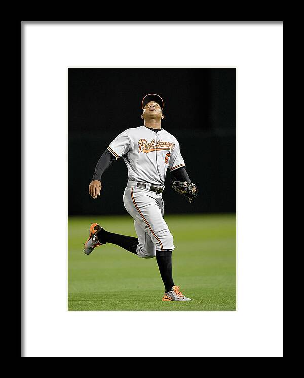 People Framed Print featuring the photograph Khris Davis and Jonathan Schoop by Thearon W. Henderson