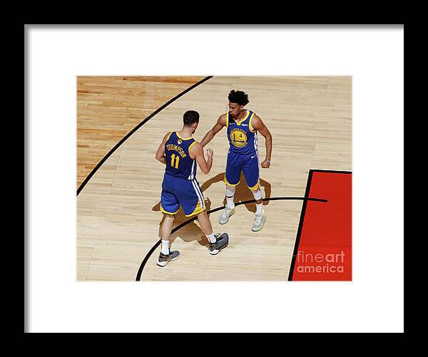 Playoffs Framed Print featuring the photograph Klay Thompson and Jonas Jerebko by Mark Blinch