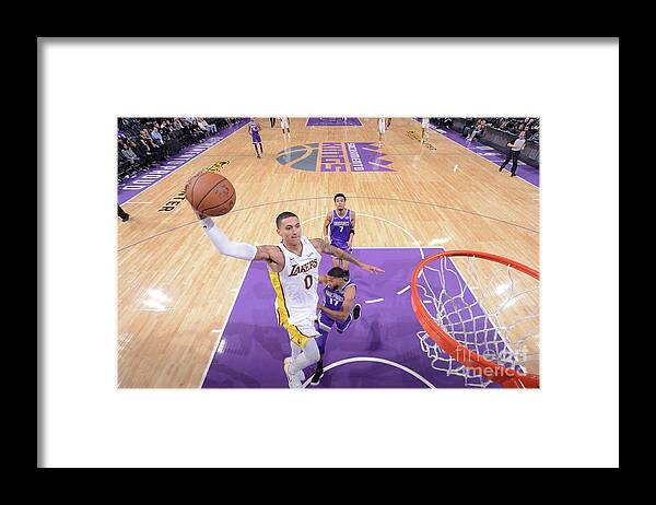 Kyle Kuzma Framed Print featuring the photograph Kyle Kuzma by Rocky Widner