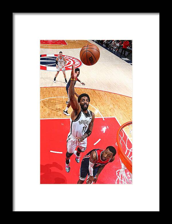 Kyrie Irving Framed Print featuring the photograph Kyrie Irving by Stephen Gosling