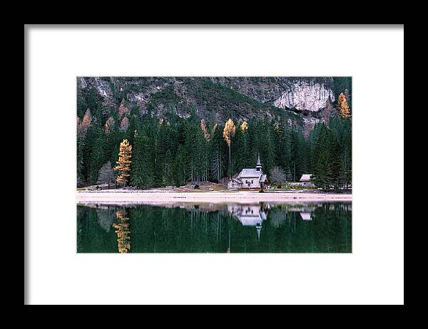 Lago Di Braies Framed Print featuring the photograph La cappella di lago Braies by Elias Pentikis