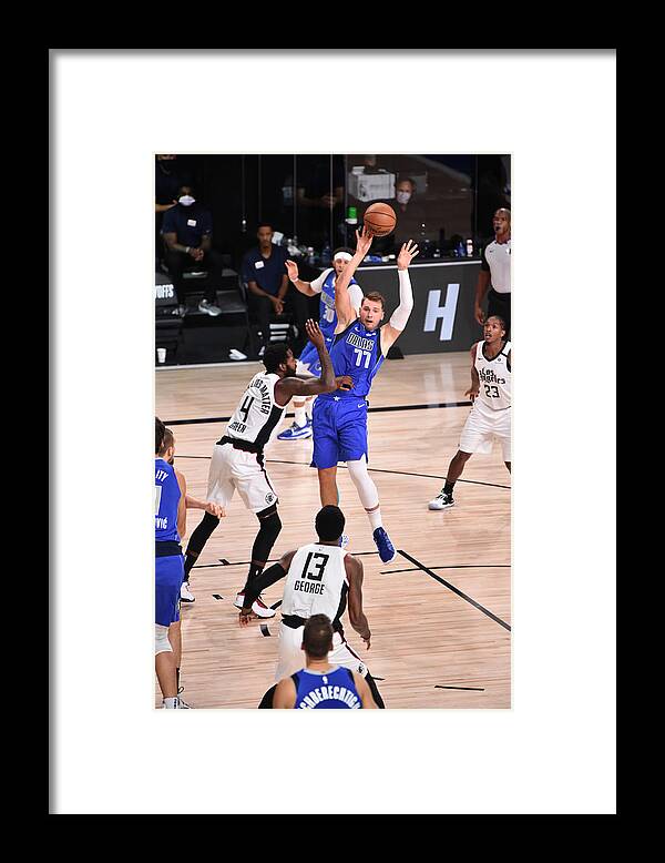 Playoffs Framed Print featuring the photograph LA Clippers v Dallas Mavericks - Game Three by David Dow