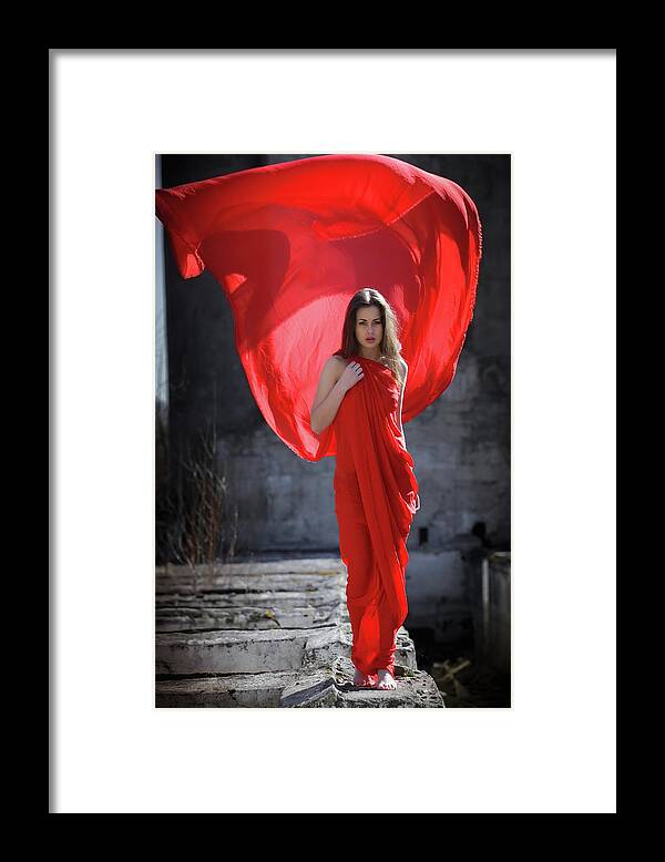 Russian Artist New Wave Framed Print featuring the photograph Lady in Red in Desolate Place by Vitaly Vachrushev